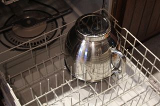 The Instant Stand Mixer Pro mixing bowl in the bottom rack of a dishwasher