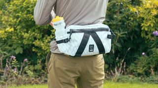 a white and black hip pack