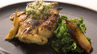 chargrilled_spatchock_kale_hazelnut_butter_roasted_shallots_close_up_