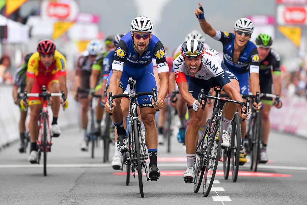 Tom Boonen of team Etixx - Quick-Step (L) wins ahead of Belgian Jonas Van Genechten of IAM Cycling (R) the sprint on the finish line of the first stage of the Tour De Wallonie