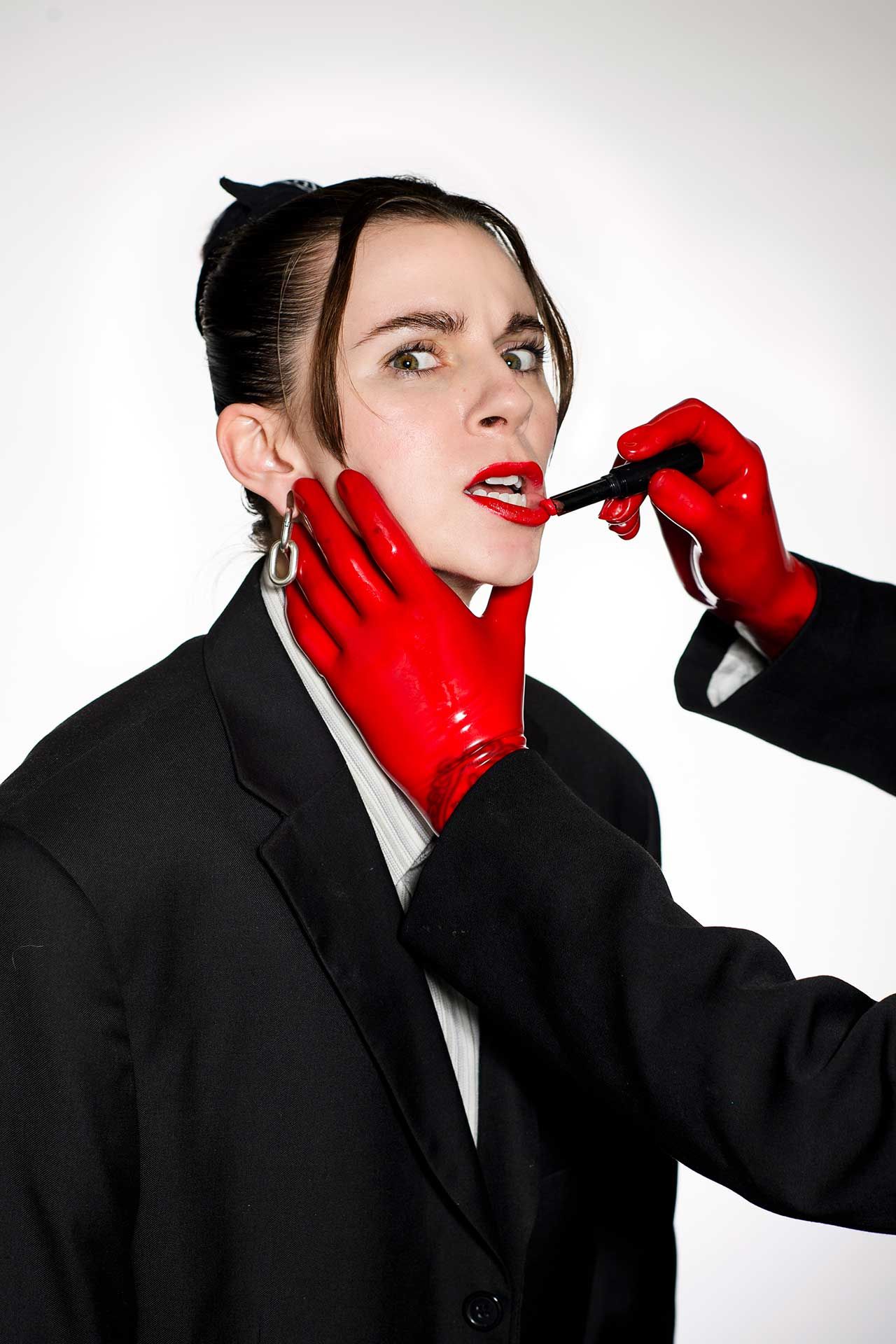 Lyndsey Gunnulfsen of the band Pvris poses for a portrait in red gloves