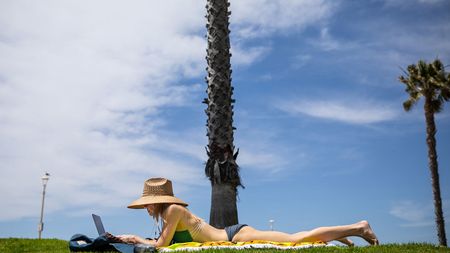 Person working on a beach 