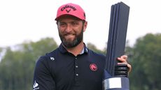 Jon Rahm holds the LIV Golf Individual Championship trophy