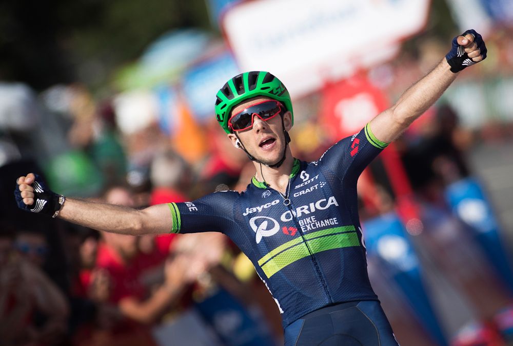 Simon Yates celebrates his solo win during stage 6 at the Vuelta