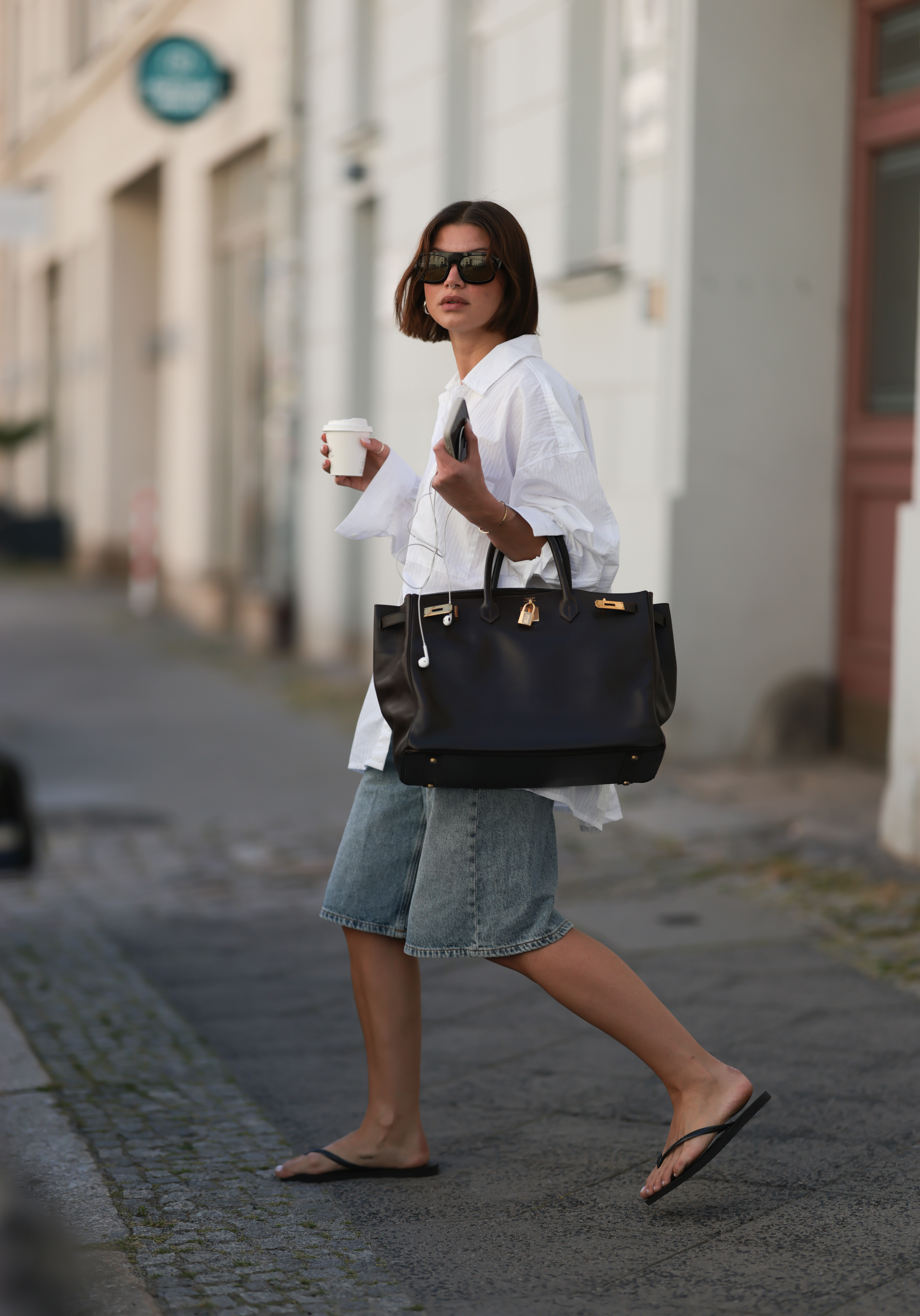 Woman wearing a shirt and jorts