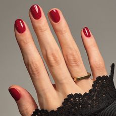 A picture of a short, oval-shaped manicure with the Essie Bubbles Only nail polish