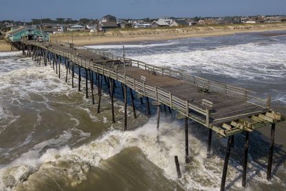 Waves from Dorian damaged a pier in North Carolina.