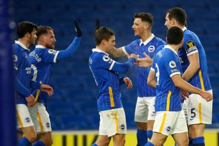 Leandro Trossard celebrates his goal with teammates