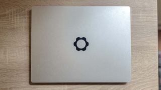 Framework Laptop 13 (2023) review unit on desk, lid facing camera