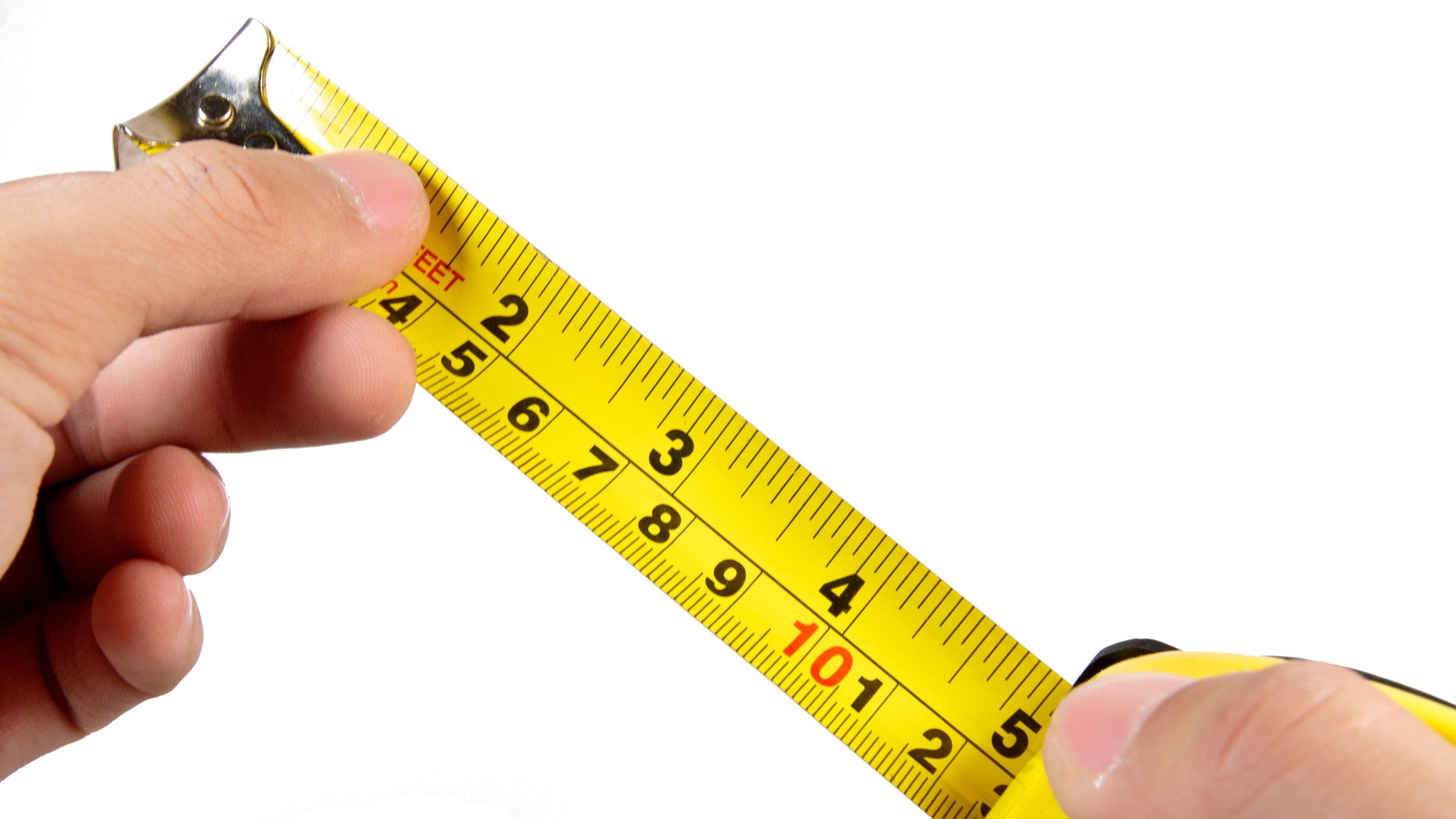 A person's hands are holding an open, yellow measuring tape. The picture represents a rule of thumb.