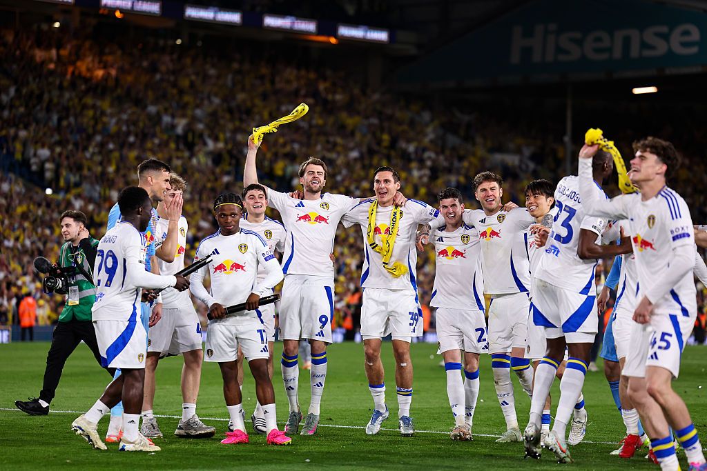 Players of Leeds Untied celebrate promotion during the Sky Bet Championship match between Leeds United FC and Bristol City FC at Elland Road on April 28, 2025 in Leeds, England.