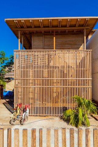 The timber clad exterior of casa Numa