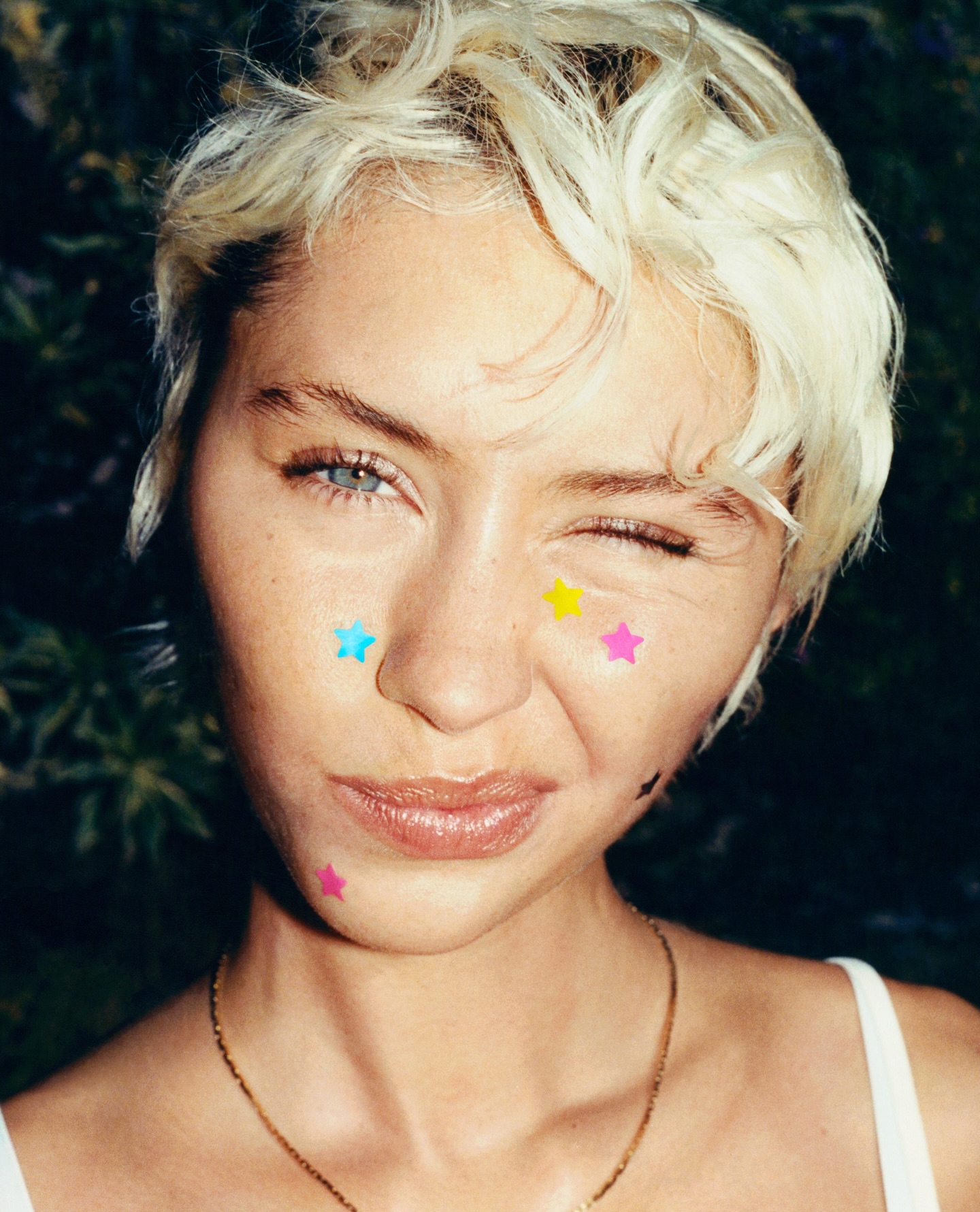 iris law wearing starface spot patches