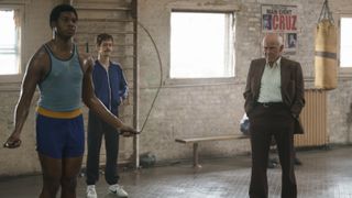 Teen Mike (B.J. Minor), Teddy Atlas (Ethan Dubin) and Cus D’Amato (Harvey Keitel) in a traiing gym in MIKE