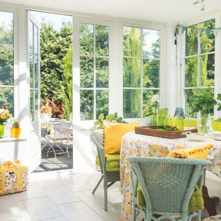 Dining area in light filled conservatory