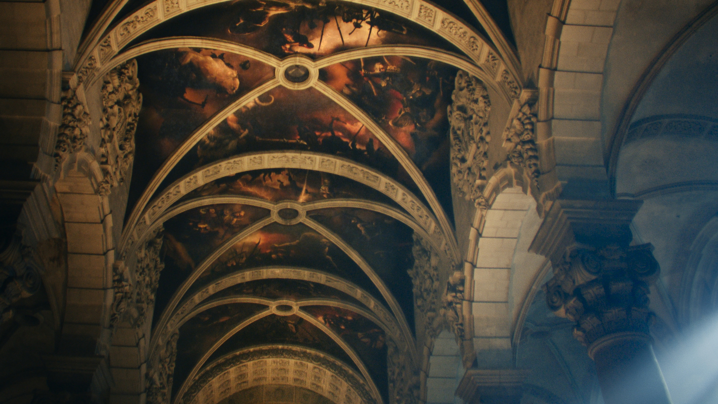 Dark fantasy artwork affixed to a cathedral ceiling.