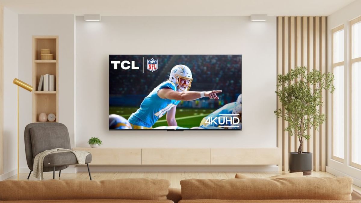 TCL TV on wall in living room