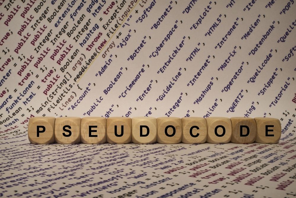 Pseudocode spelt out in wooden blocks in front of code text