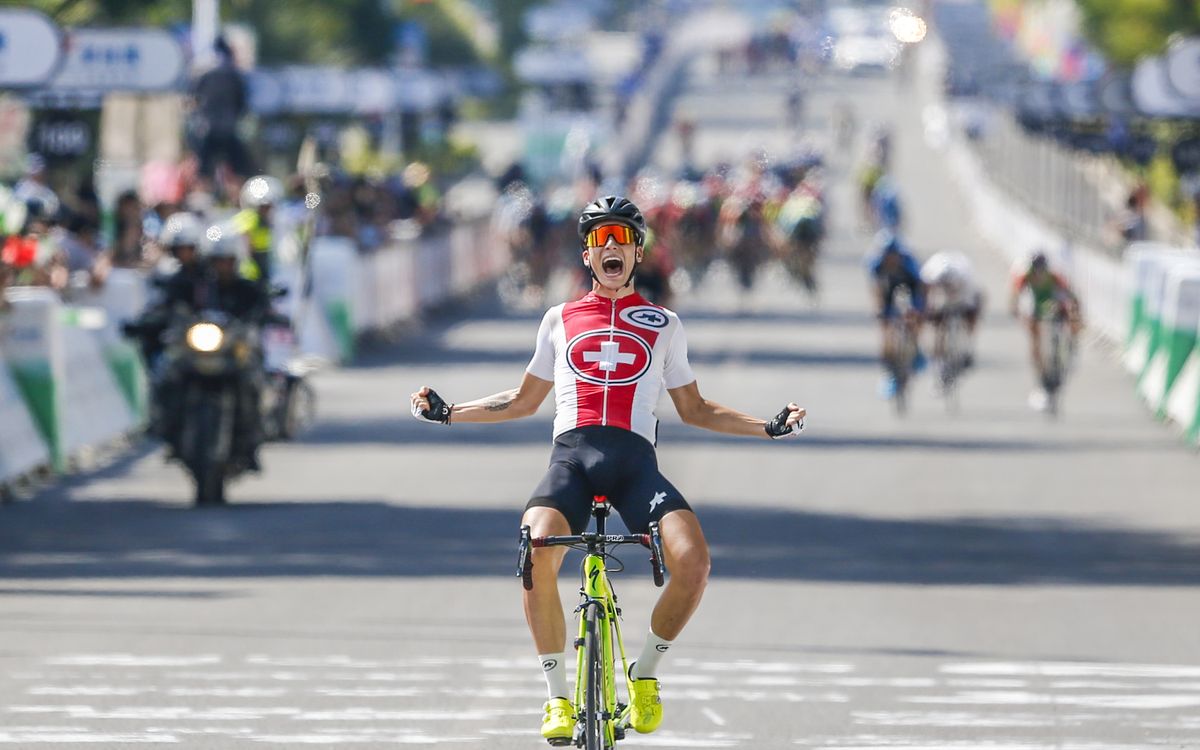 Simon Pellaud celebrates his win