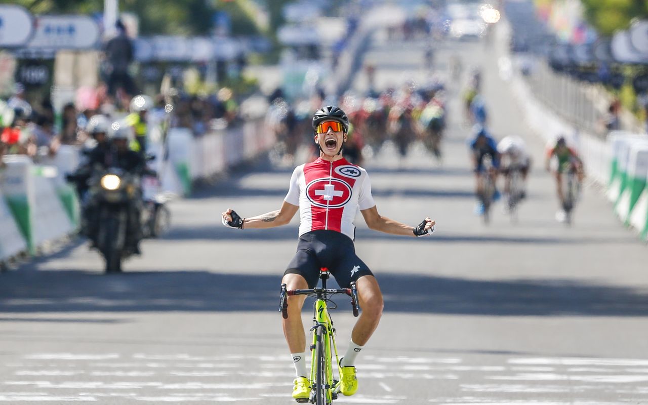 Simon Pellaud celebrates his win