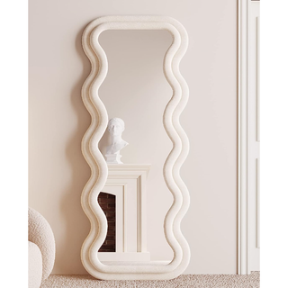floor-length mirror with a cream wavy border