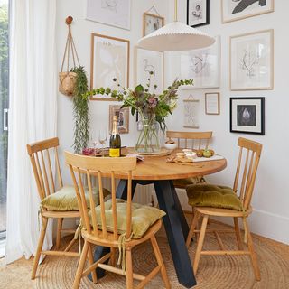 corner gallery wall with dining table