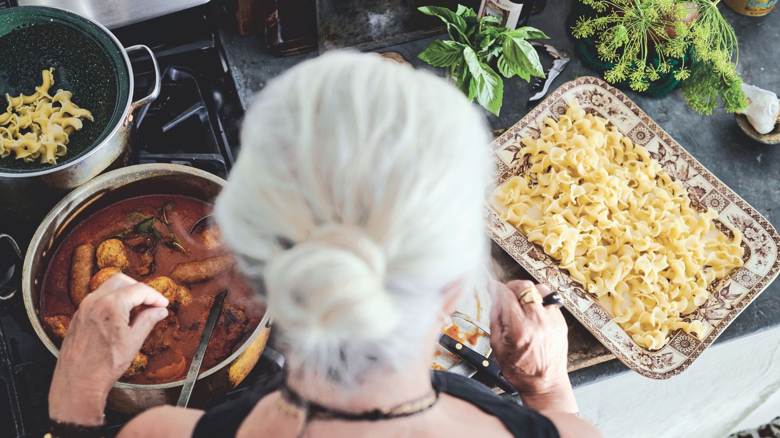 Lucinda Scala Quinn cooking pasta