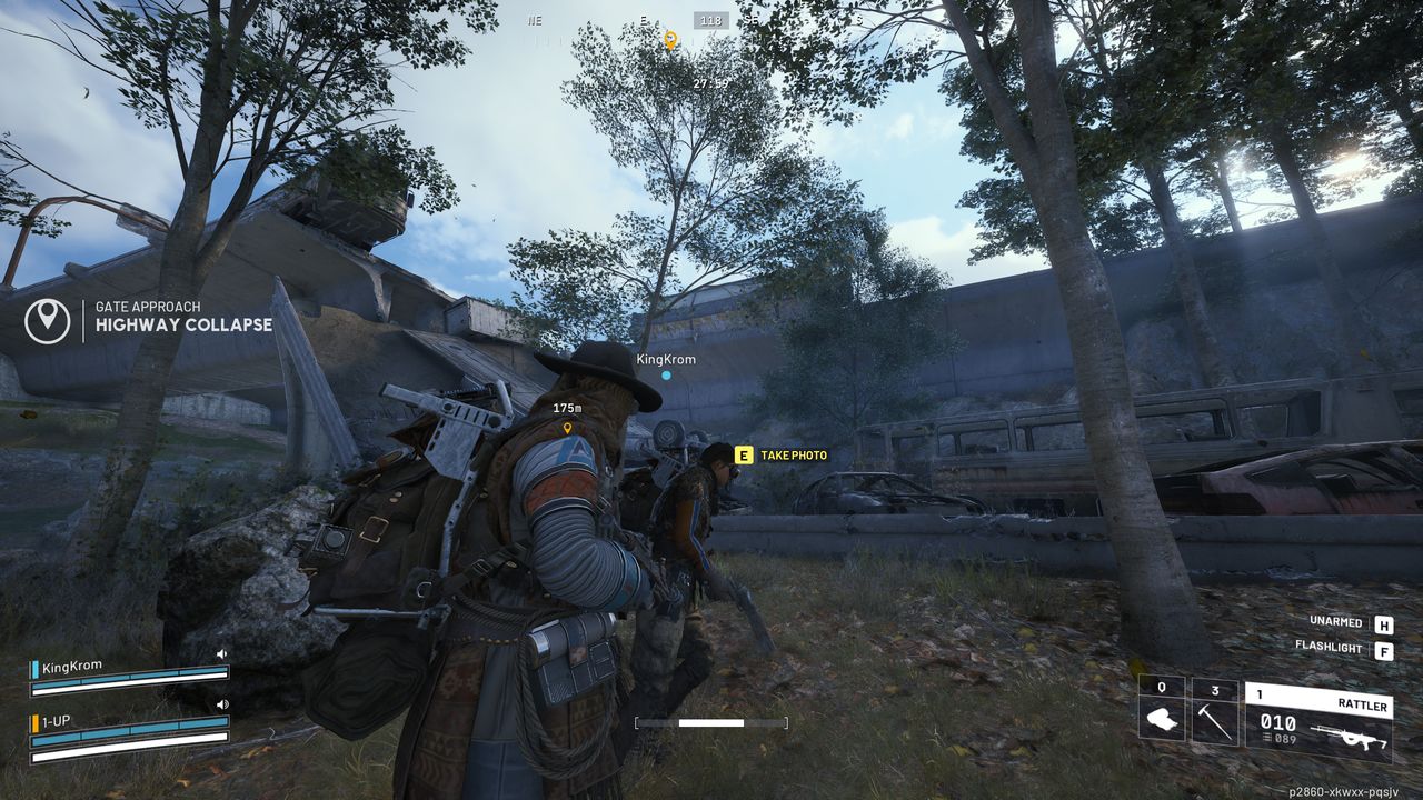 Arc Raiders Reduced to Rubble: A player about to take a photo of the collapsed highway, stood next to the highway, trees, a rock, and another player.