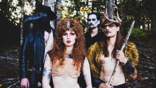 Castle Rat in costume posing in a forest