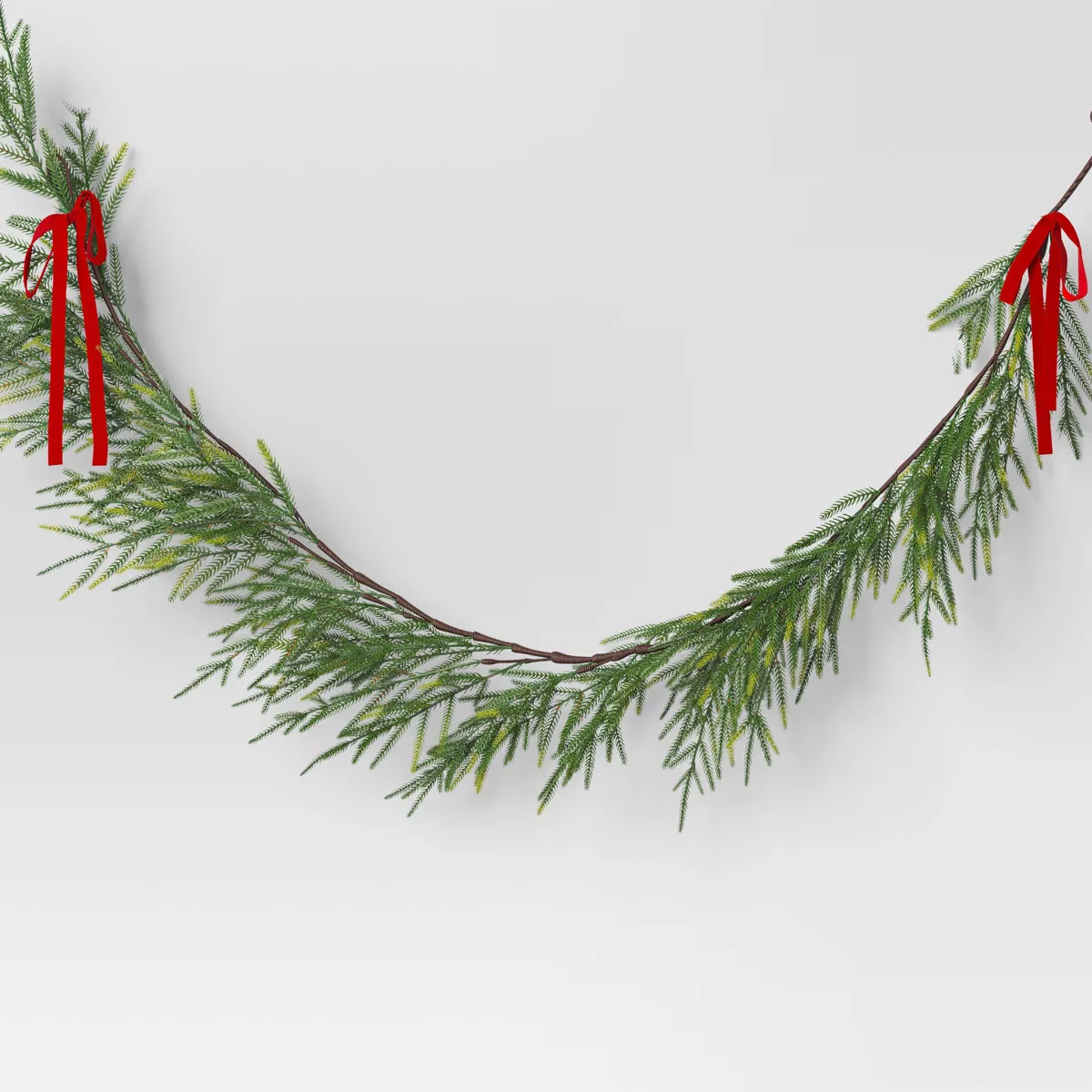 6u0026#39; Christmas Unlit Norfolk Pine Draping With Red Bows Garland - Wondershopu0026#8482;