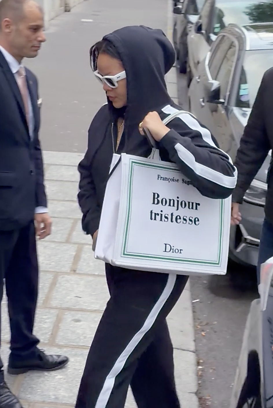 Rihanna debuted a new Dior Book Tote in Paris, alongside a surprisingly sporty tracksuit