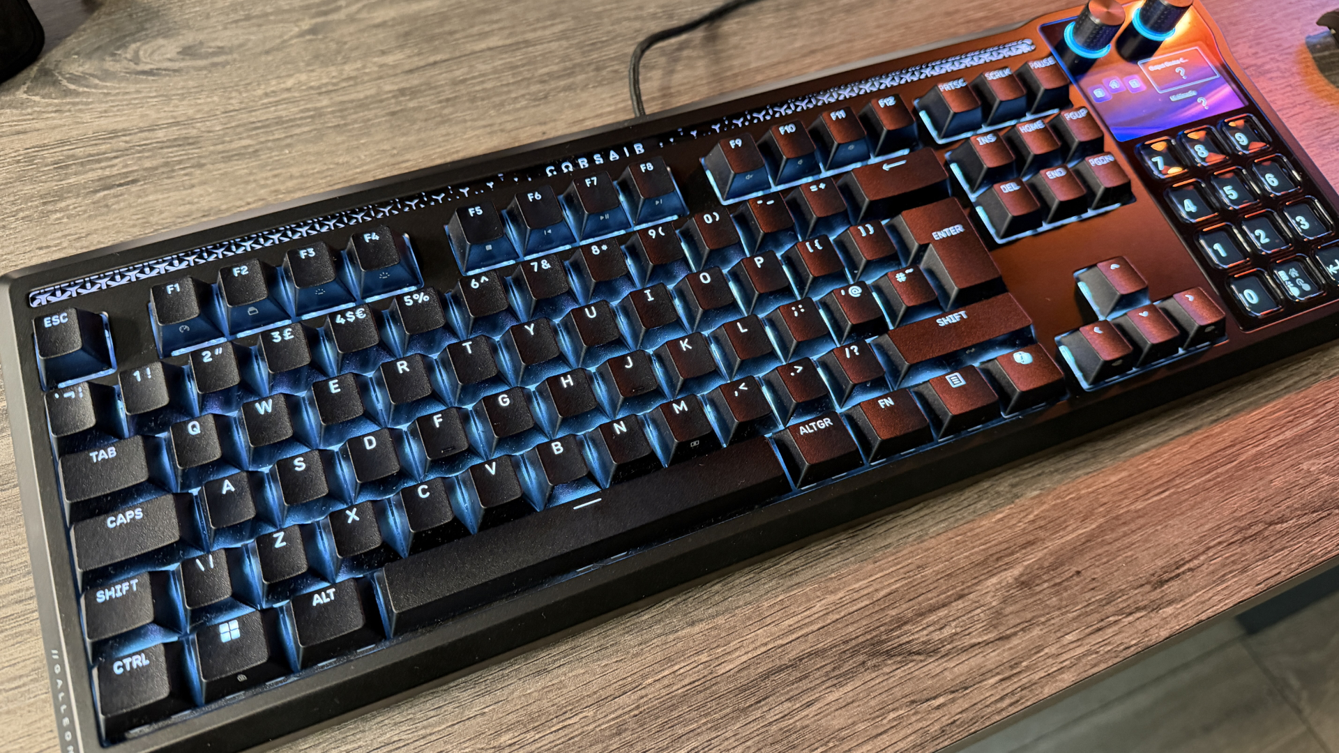 Corsair Galleon 100 SD keyboard on wooden desk
