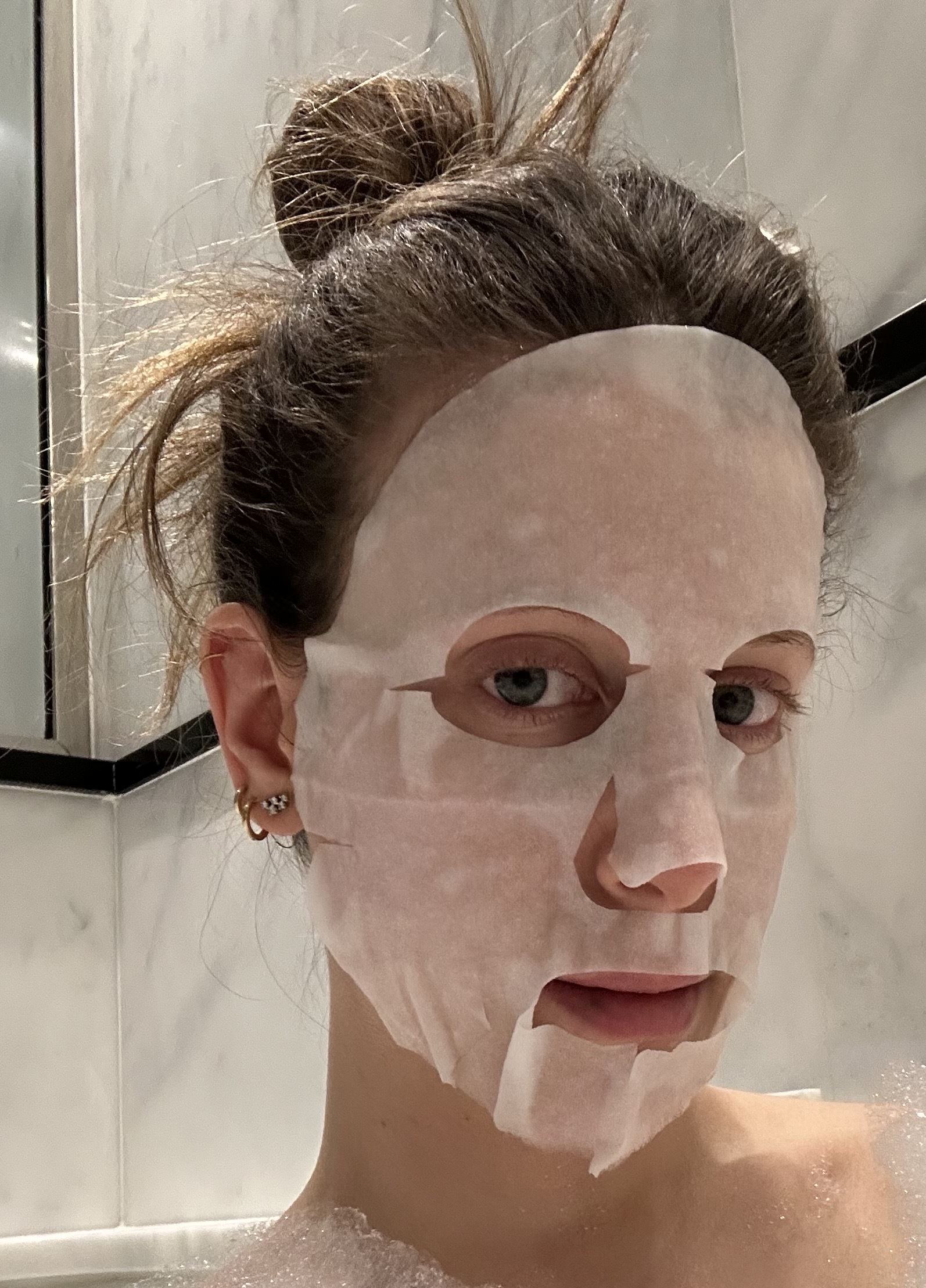 Photo of Jamie Schneider wearing the SK-II sheet mask