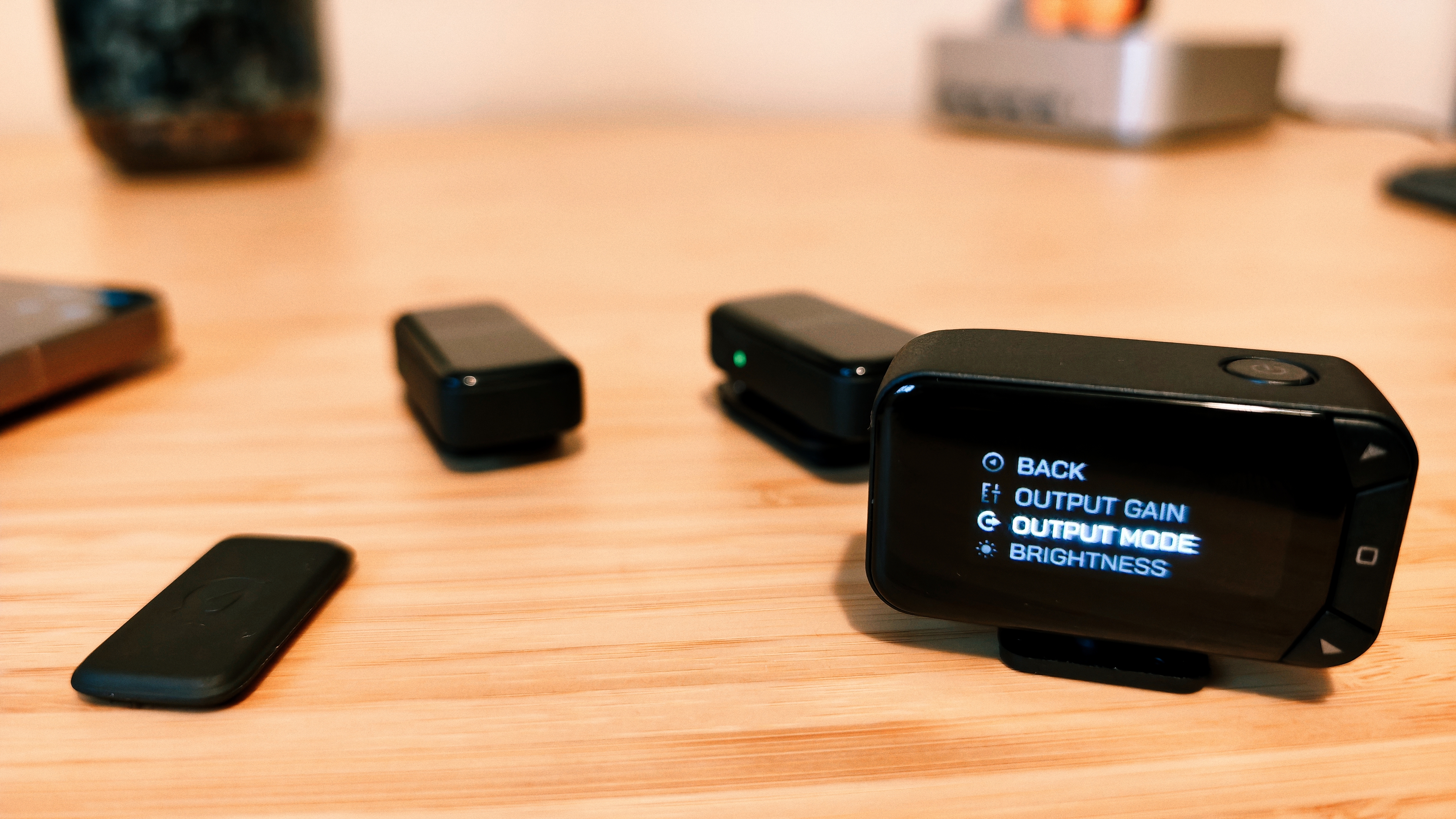 A Rode Wireless Micro Camera Kit on a wooden desk