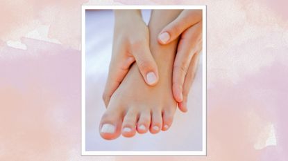 A close-up of a hand and foot with a milky white pedicure and manicure/ in a purple and beige watercolour paint-style template