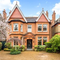 red brick house with garden