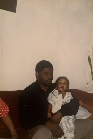 the writer as a toddler with her father ﻿