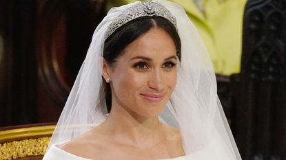 Why we could see Meghan Markle wear two crowns. Seen here Meghan Markle stands at the altar during her wedding