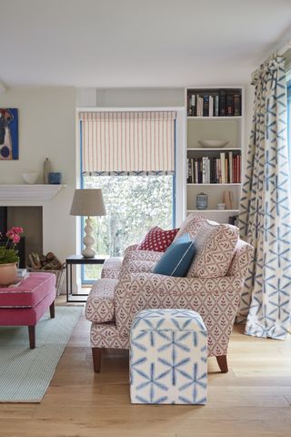 living room with decorative rollerblind curtains and sofa