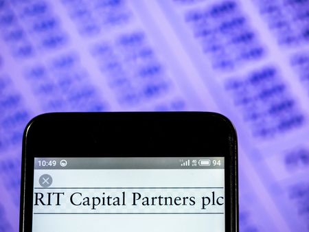 RIT Capital Partners plc company logo seen displayed on a smart phone