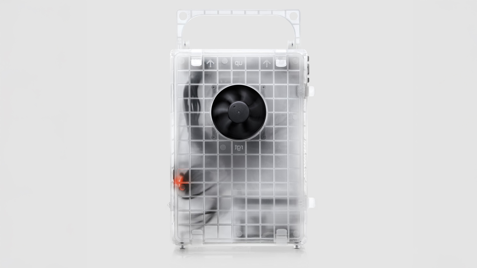 Teenage Engineering computer-2 transparent PC case on grey background