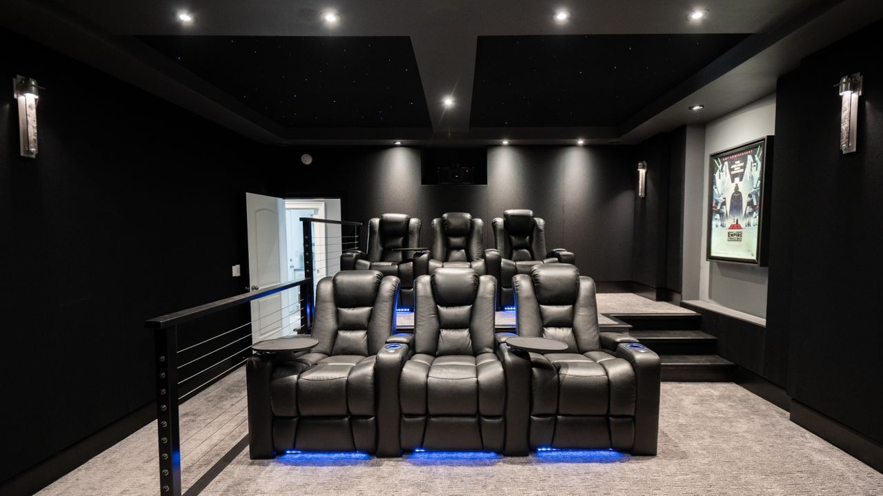 Basement Buildout Magic home theater showing seats, lighting and screen