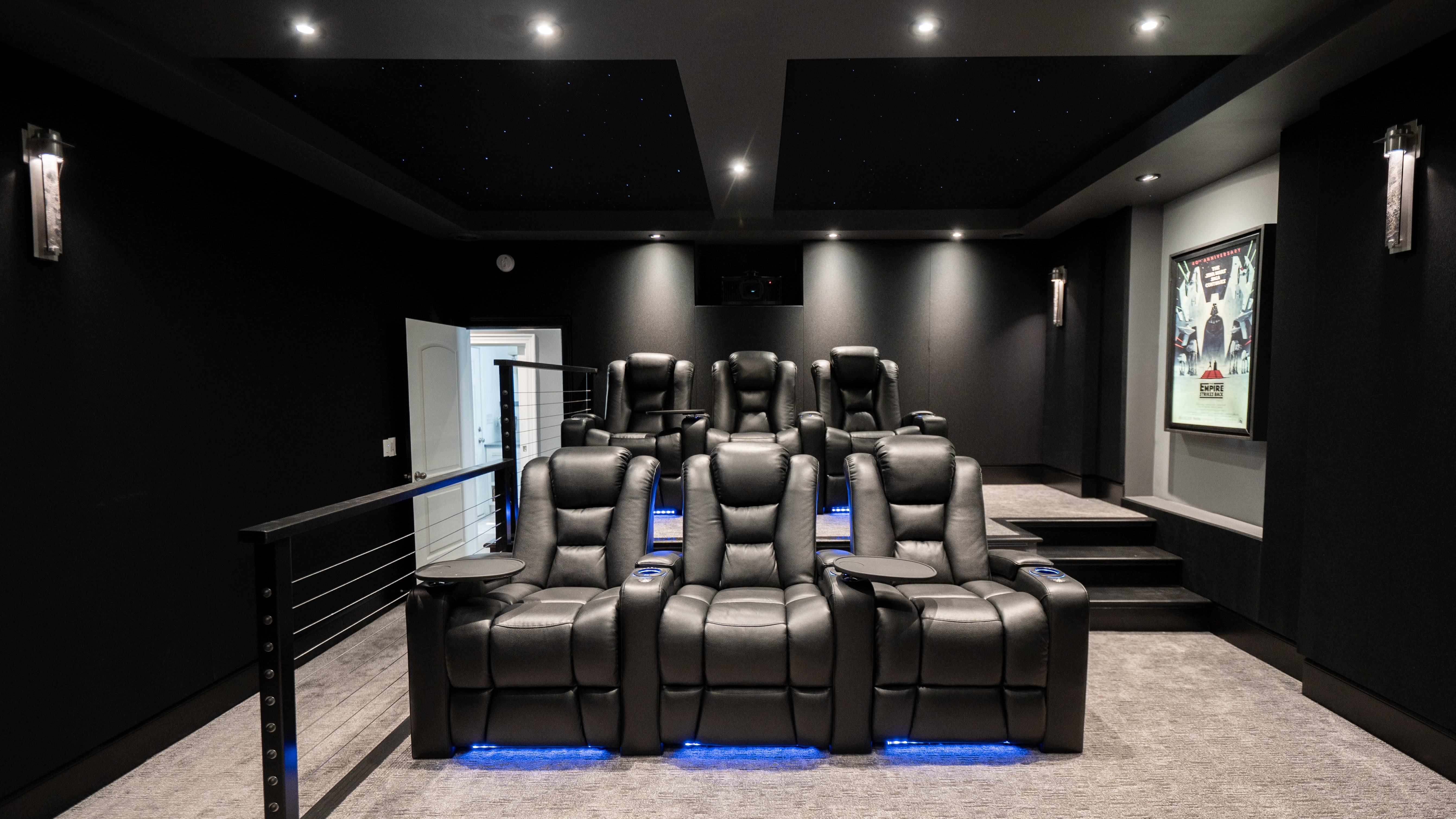 Basement Buildout Magic home theater showing seats, lighting and screen