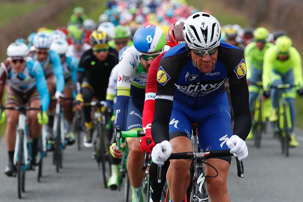 Stijn Vandenbergh (C) rides during the second stage of Paris-Nice.