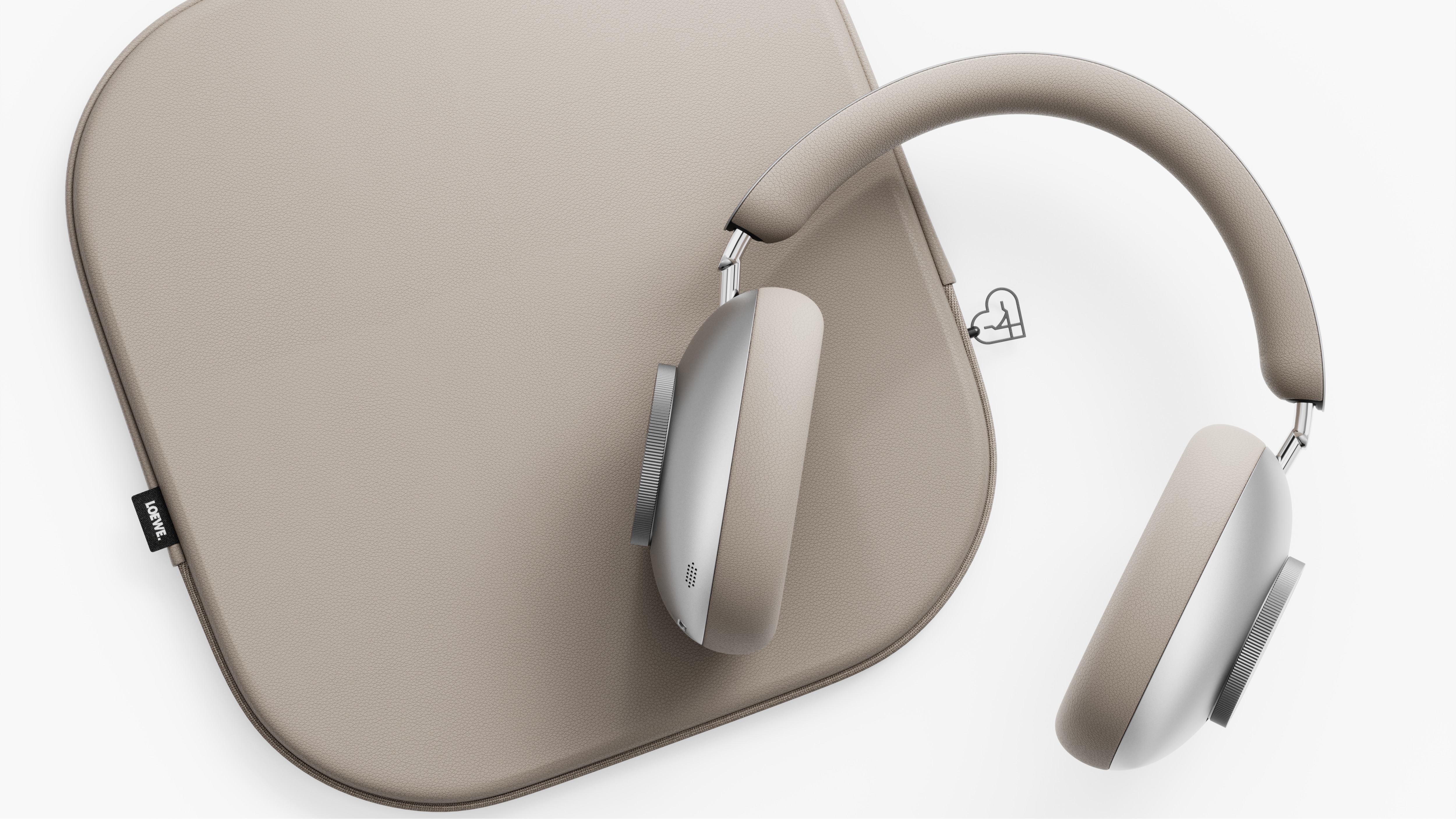 Loewe Leo over-ear headphones in beige with the carry case