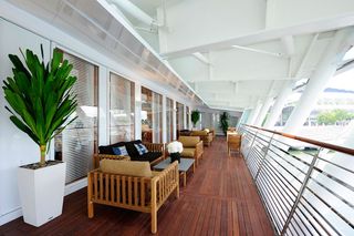 A loggia off the mezzanine overlooks the harbour like a ship's upper deck