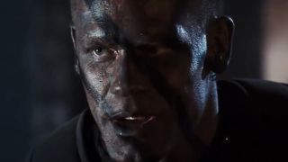 John Cena with war paint on his face in The Marine