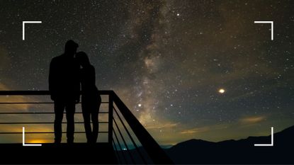 Shadow of a couple standing on a ledge, looking up at a starry night sky, representing best sex positions for your zodiac sign for those interested in the Kamasutra and astrology
