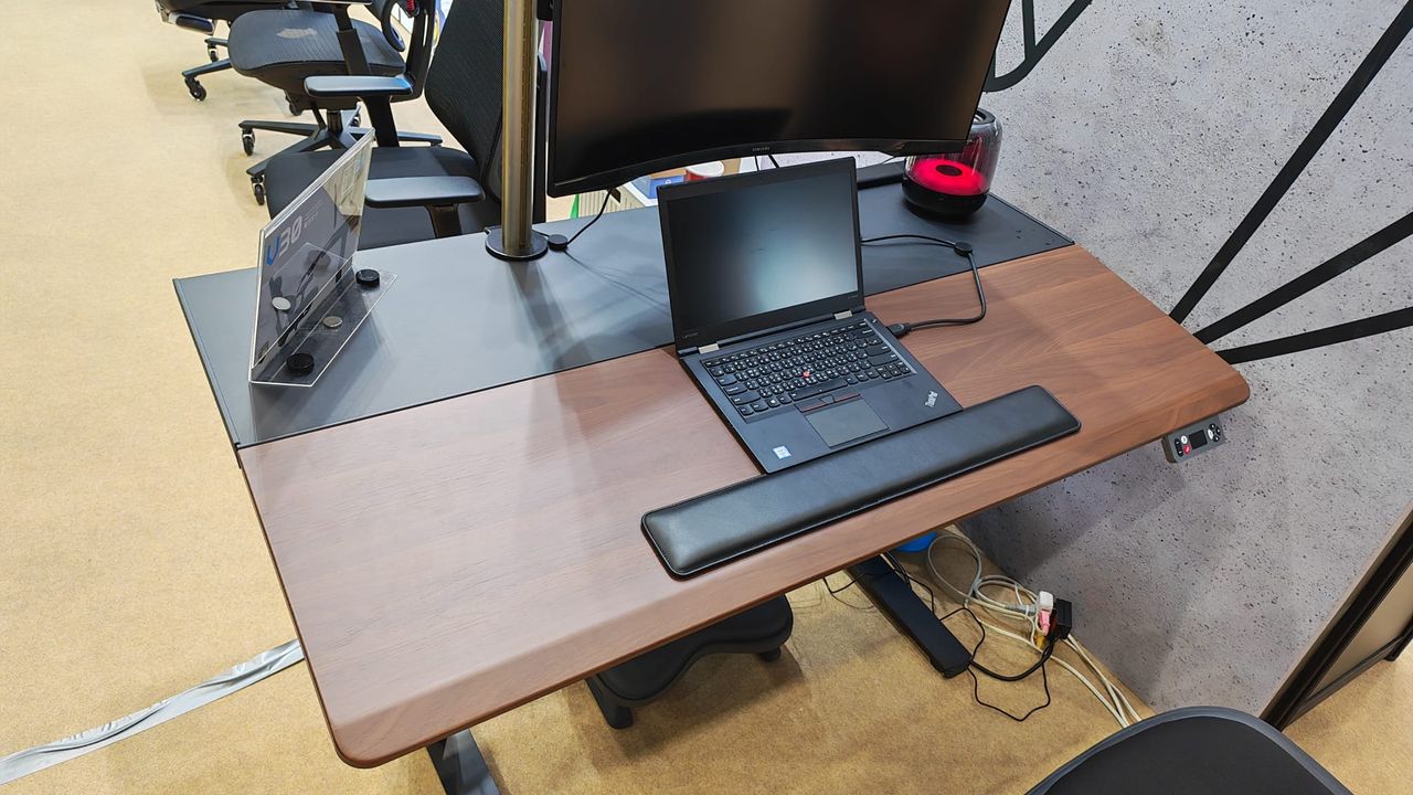 The tilting desktop surface of MarsRhino's standing desk