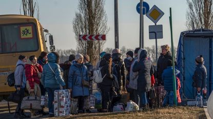 Ukrainians evacuate from their homes in the Donetsk region.